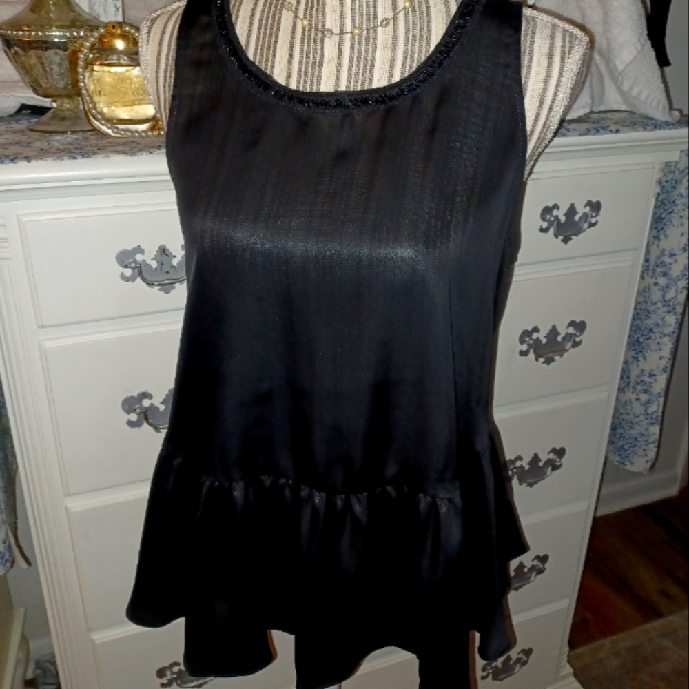 Juicy Couture size Med, Black satin with black beaded scooped neck line, ruffles